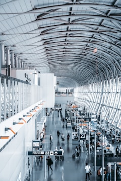 people walking inside airport station