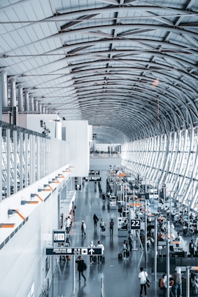 people walking inside airport station