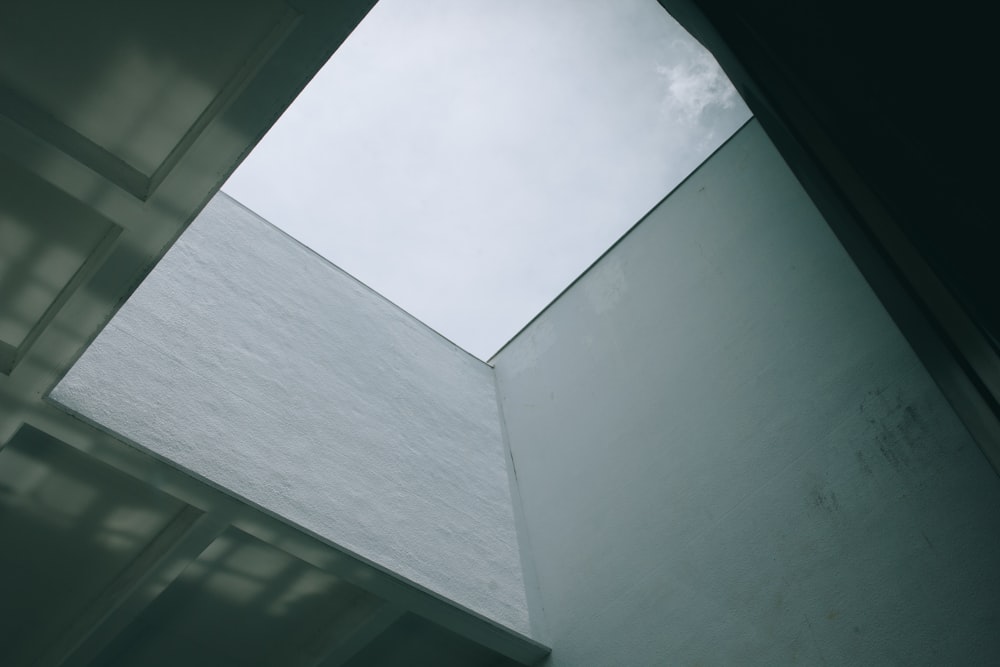 low-angle photography of gray concrete interior