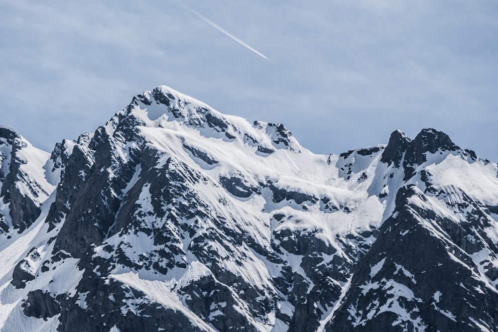 snow covered mountain during daytime