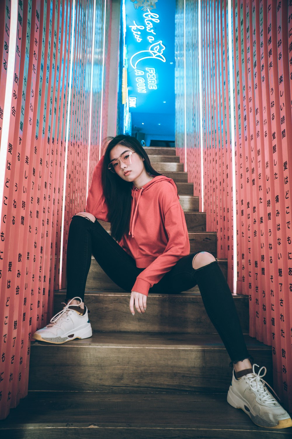 woman sitting on stairs