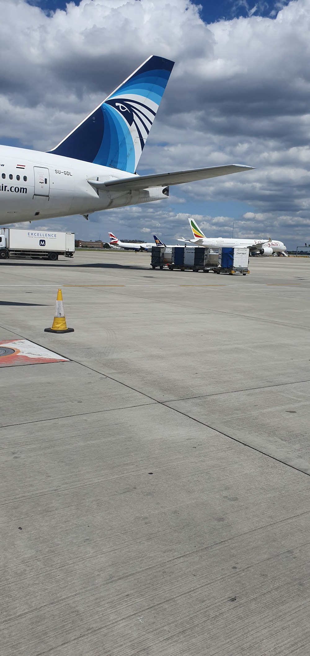 a large jetliner sitting on top of an airport tarmac