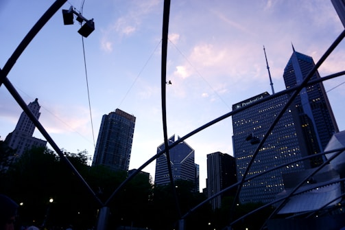 Abstract neural network graphic overlaying a city skyline at dusk