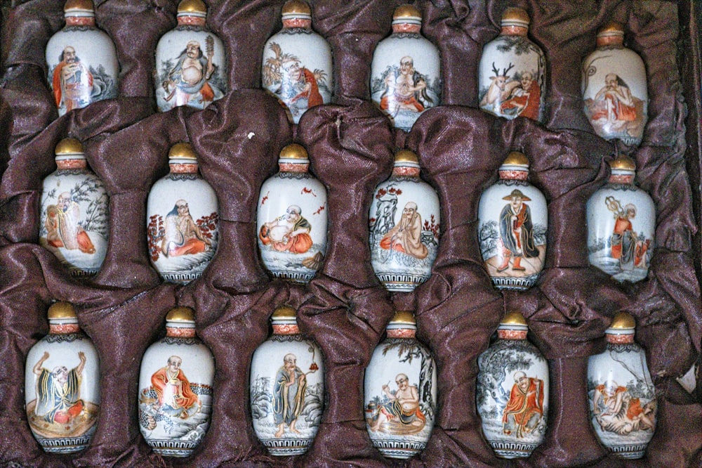 white and multicolored decorative jars