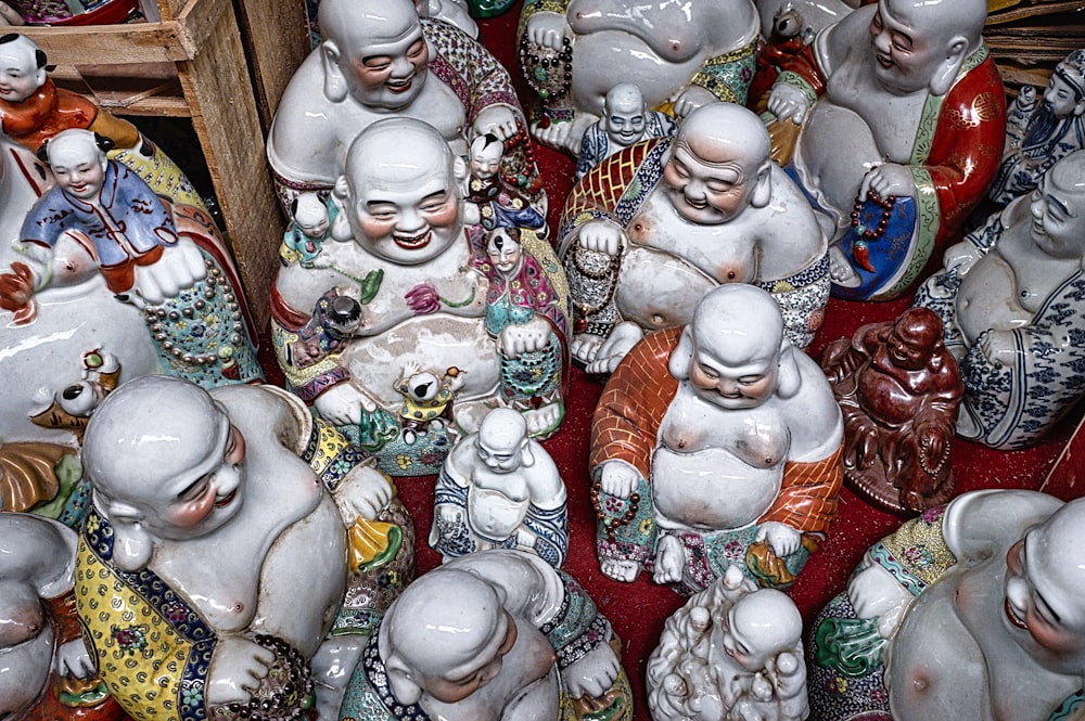 grey Buddha ceramic figurine lot