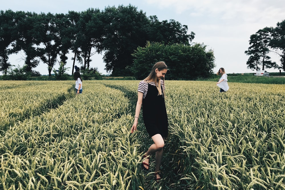 woman standing on grass field