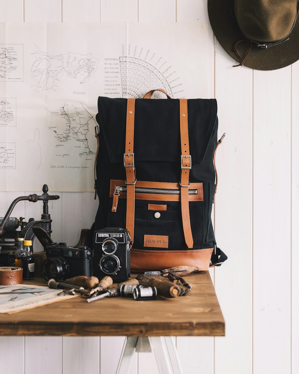 black and brown backpack on table