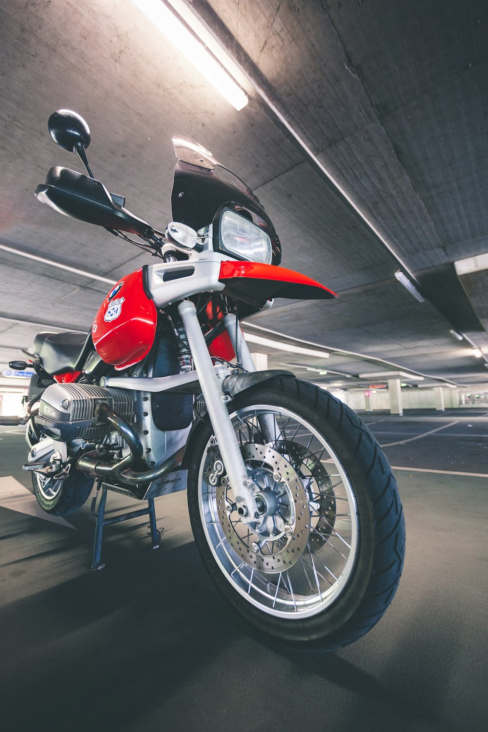 red dual-sport motorcycle