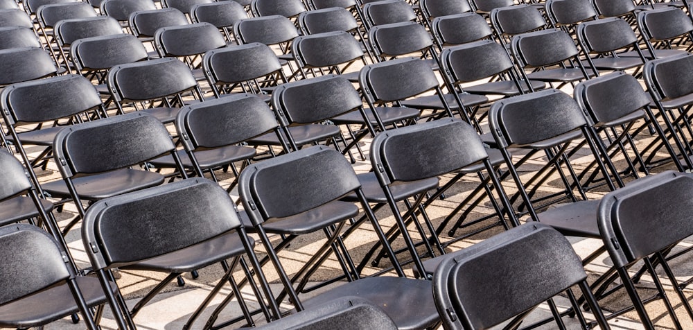 black folding armless chair lot