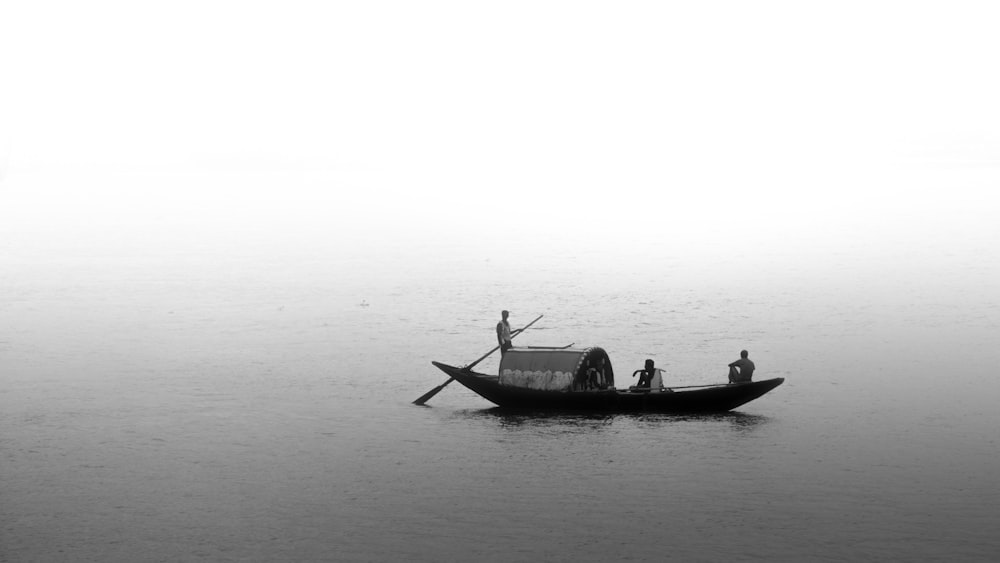 three person on boat