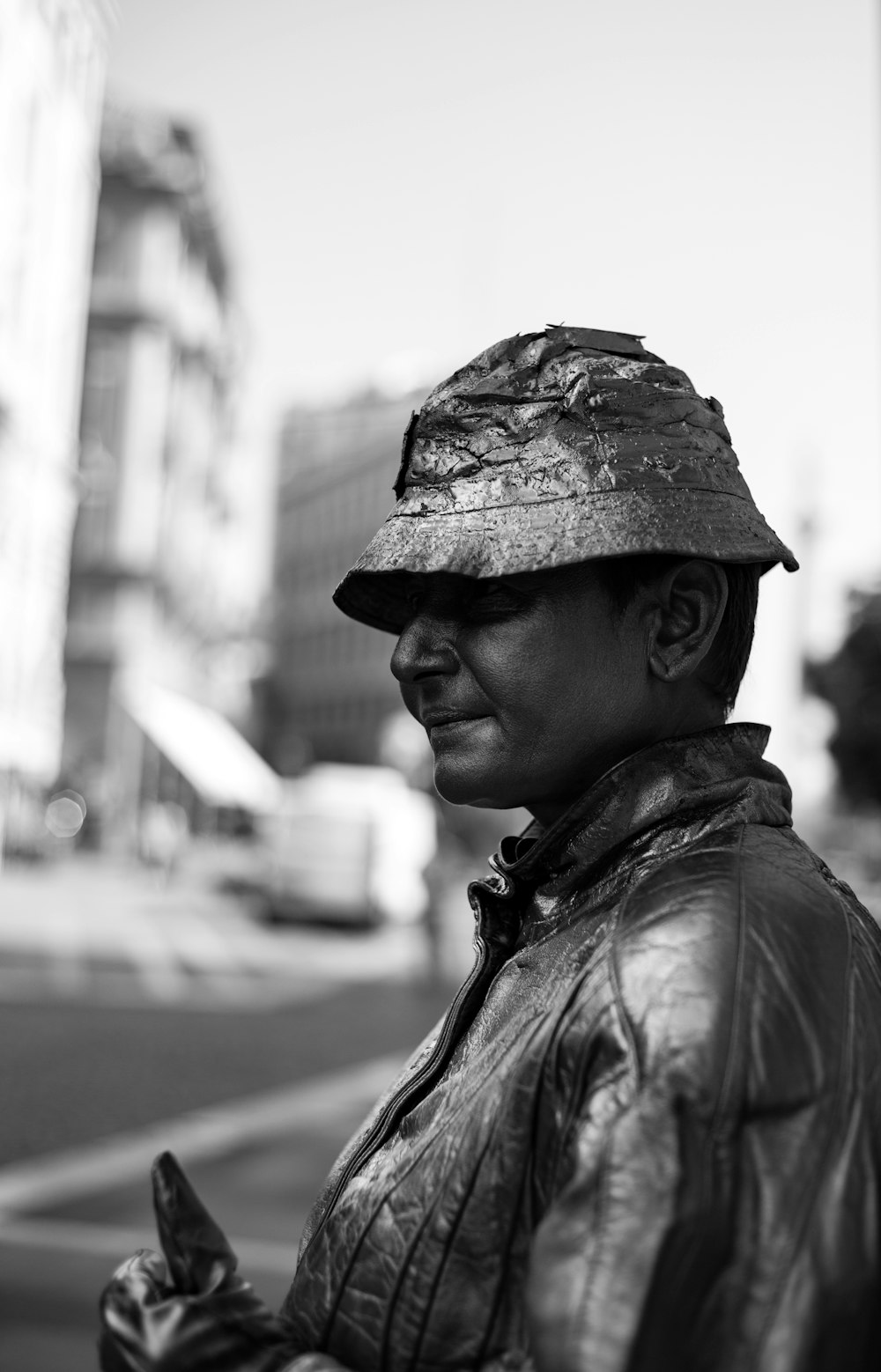 selective focus photography of man standing near outdoor during daytime