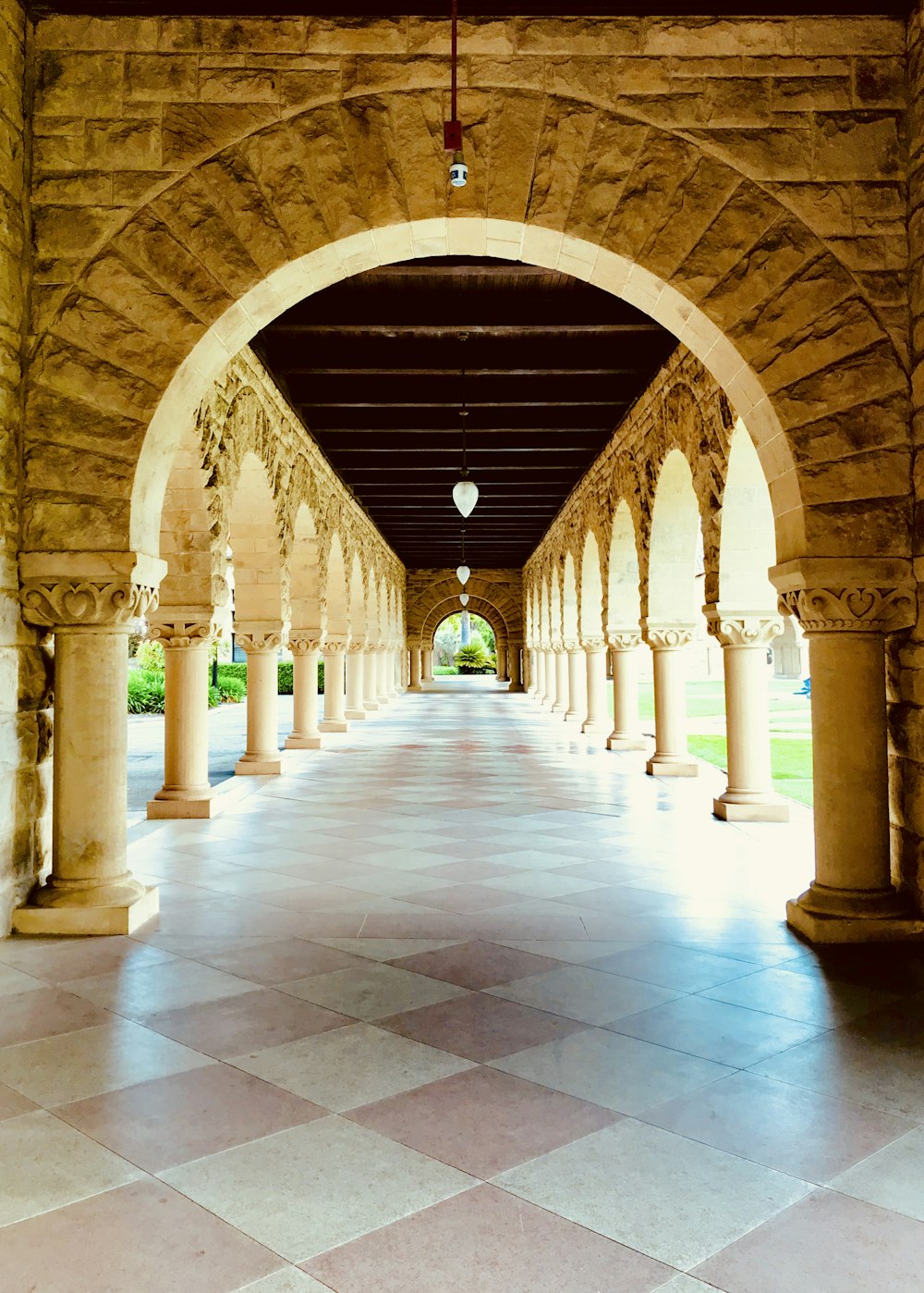 alley photography of walkway during daytime