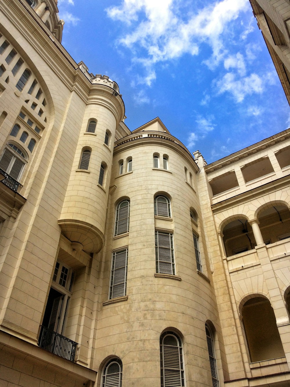 brown concrete building in low angle photography