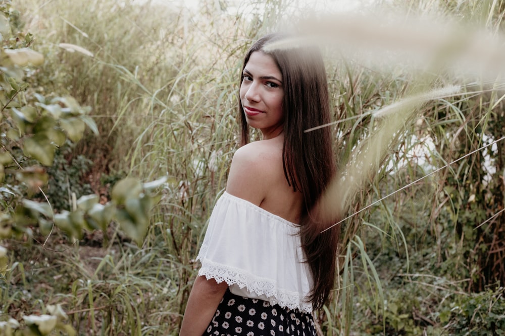 woman near grasses