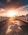 empty grey bridge during daytime