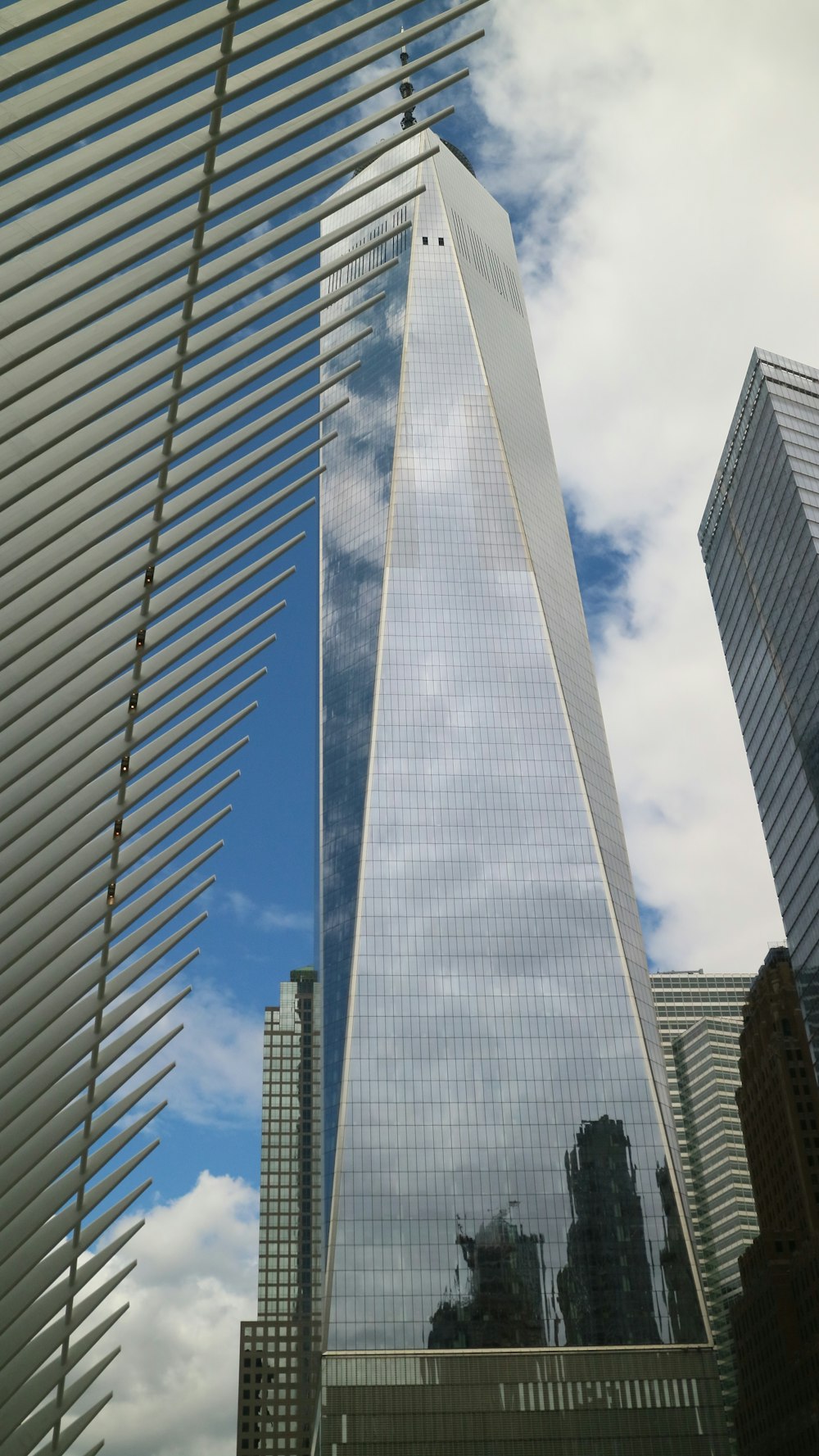 clear glass walled high-rise buildings