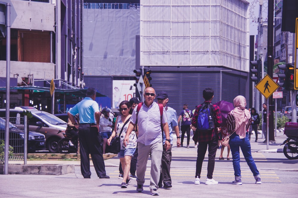 people walking on street near buildings