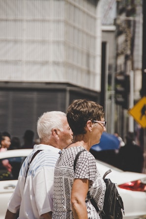 man and woman standing next to each other