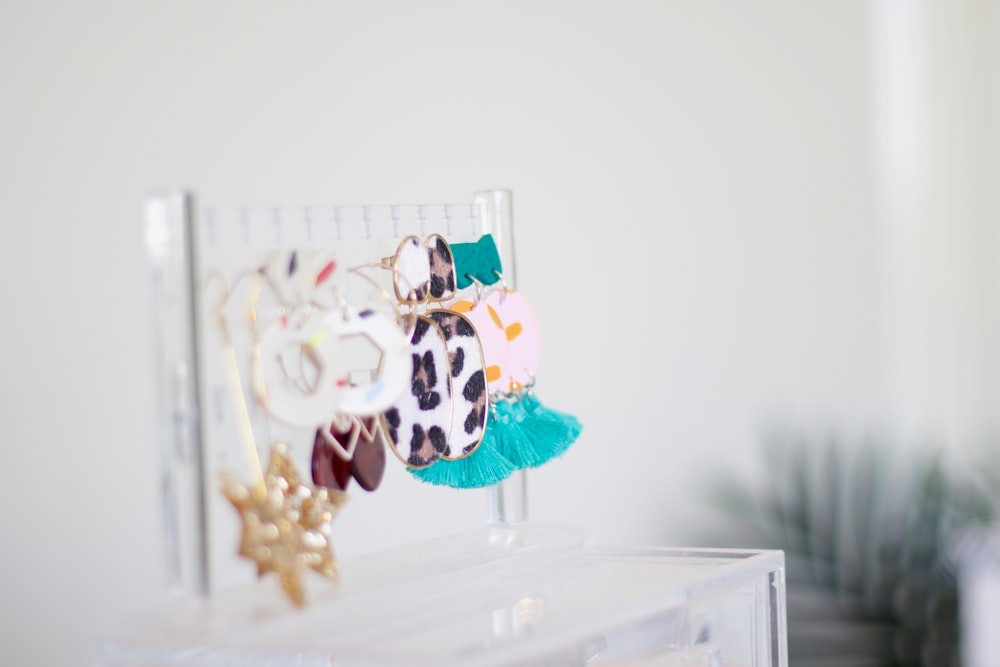 assorted-color-and-design earrings