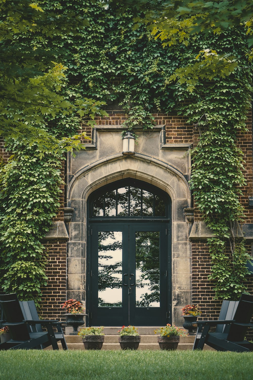 black wooden framed and clear glass storm doors