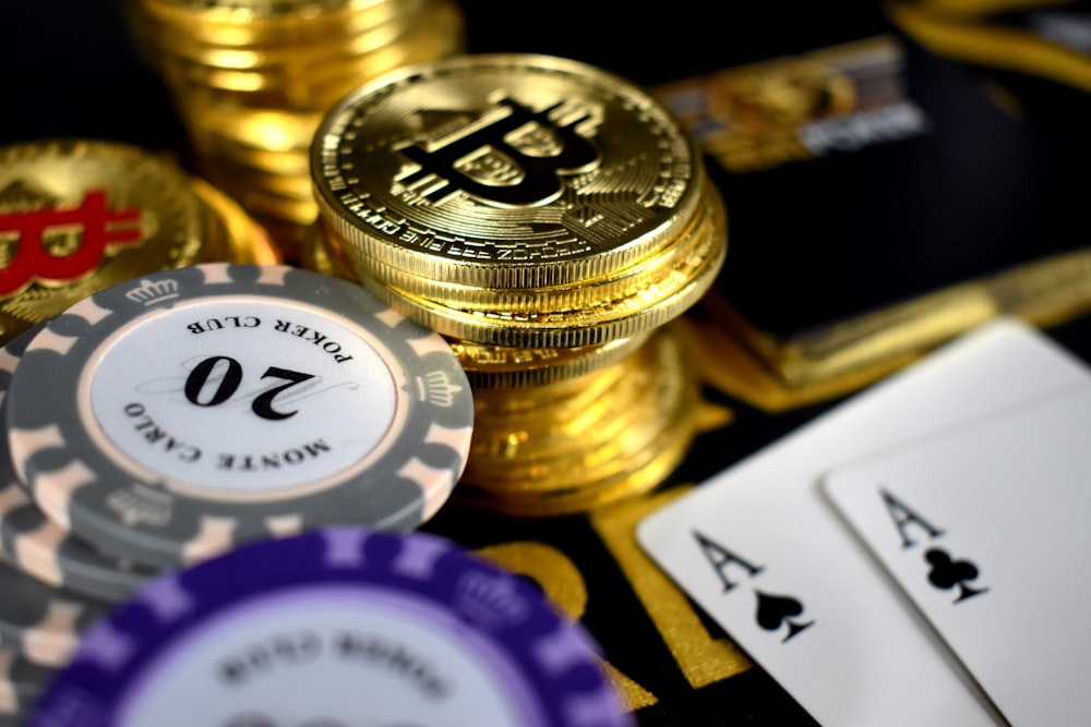 golden-colored Bitcoin coin close-up photography