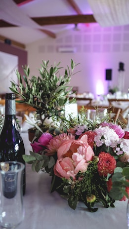 A vibrant table setting with floral arrangements.