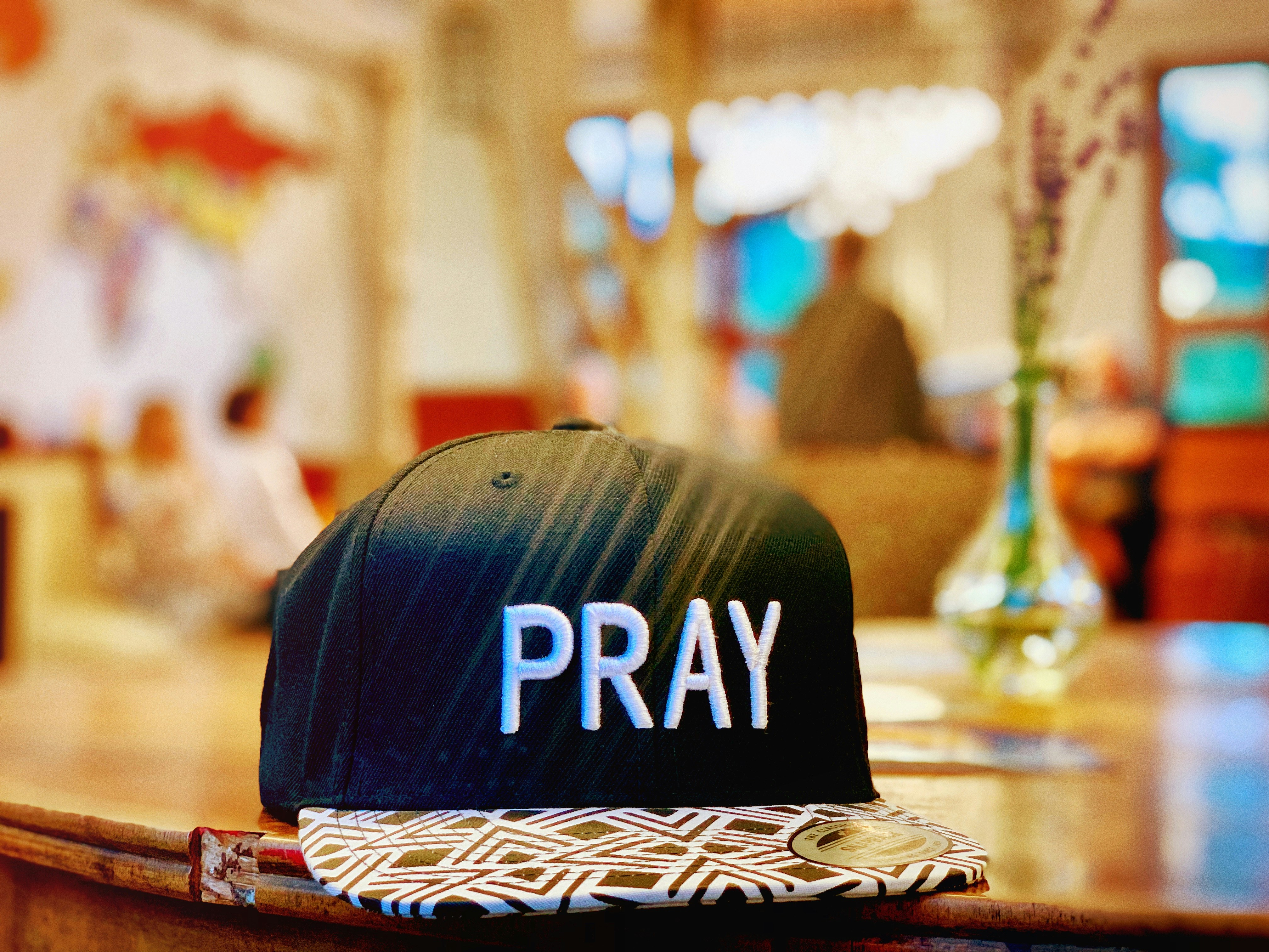 black and gray fitted cap