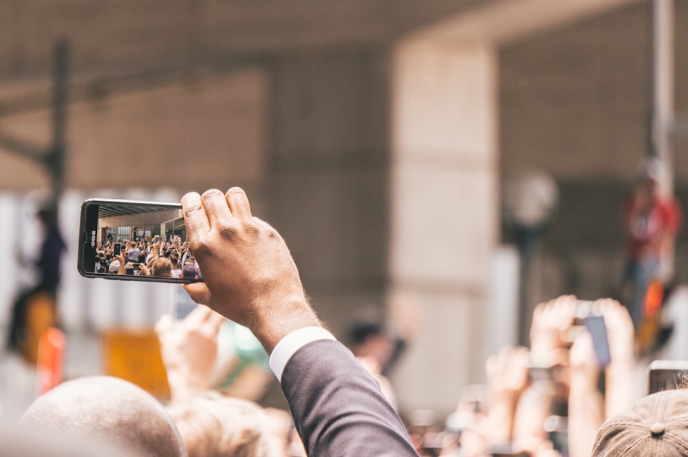 man holding smartphone