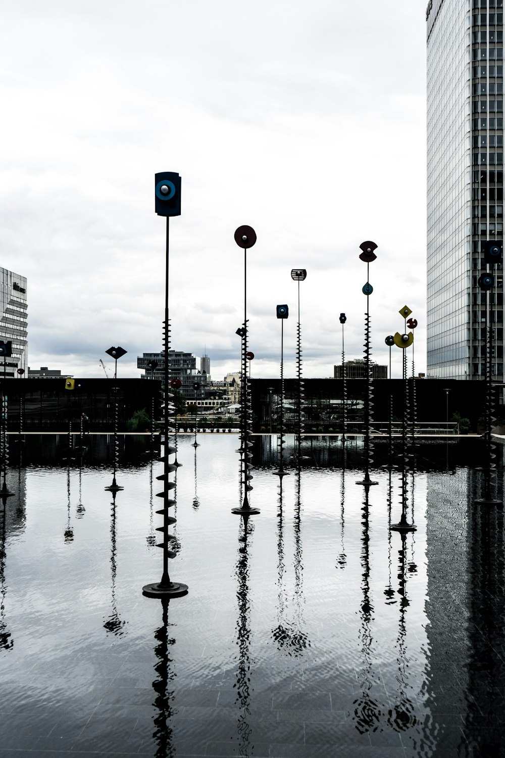 a bunch of street lights that are in the water