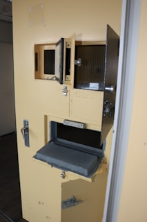 A compact 3x3 container used as a secure bicycle storage with a sliding door.