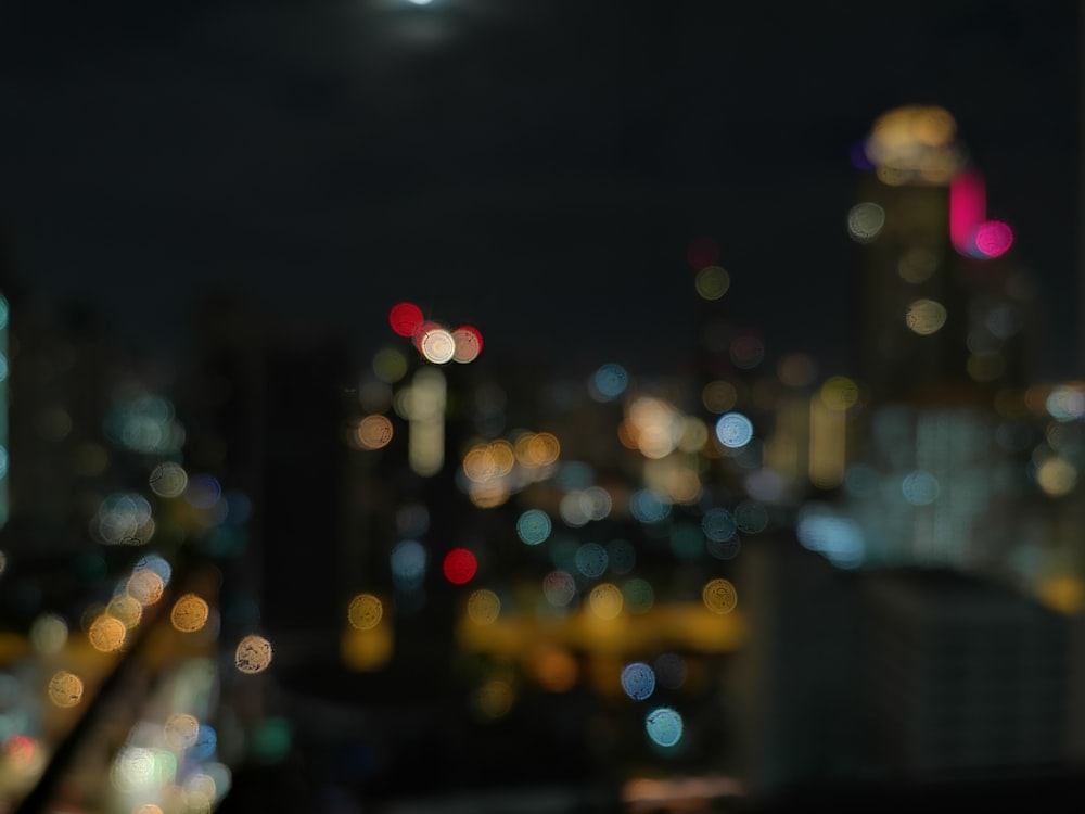 a blurry photo of a city at night