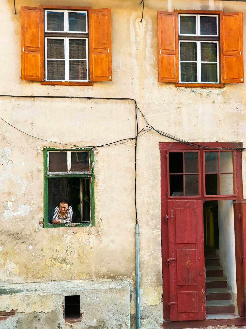 man near window