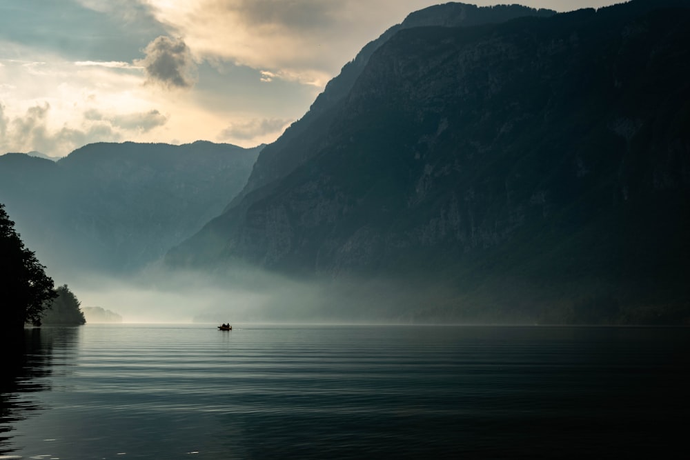 body of water near mountain