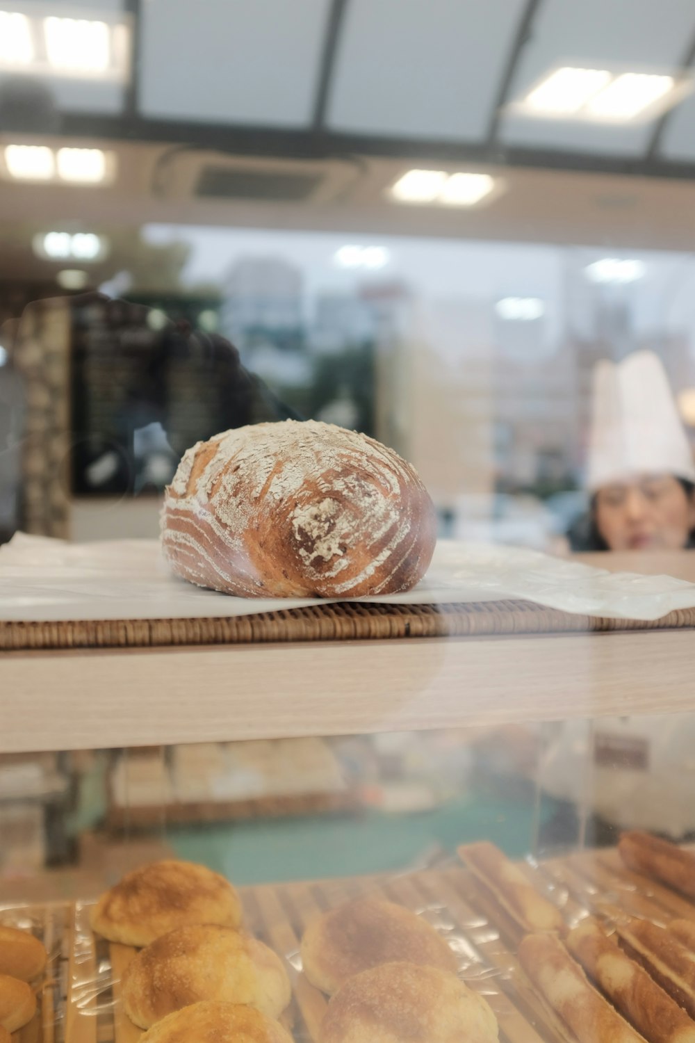 baked pastry on clear glass display counter