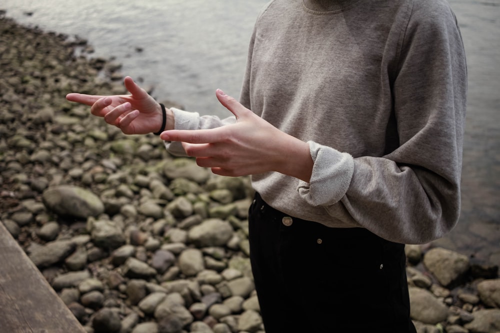 person wearing gray jacket