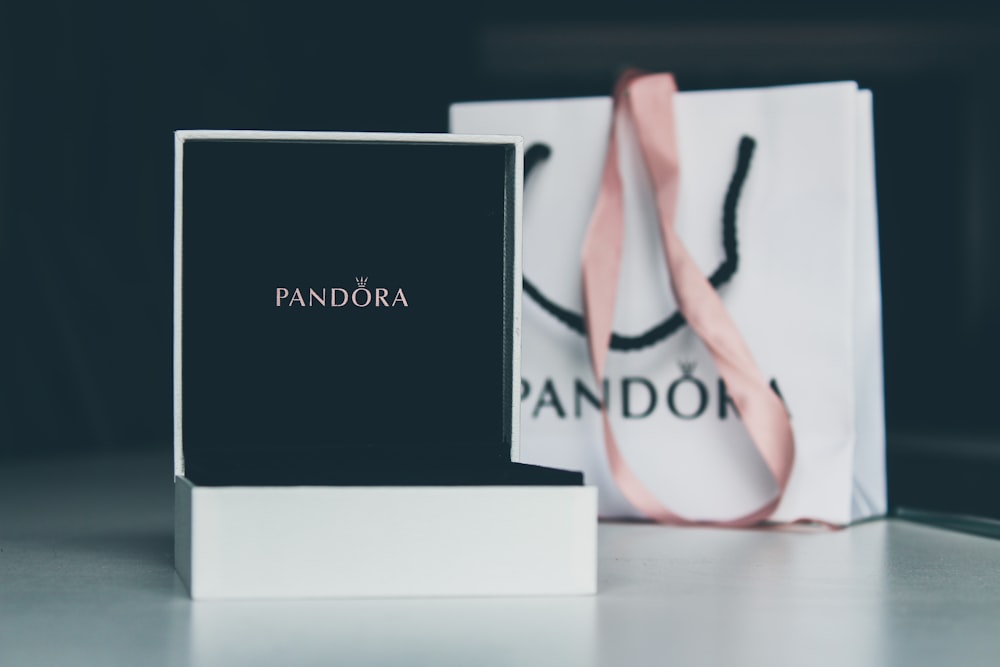 white Pandora shopping bag