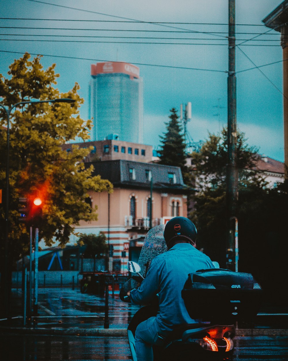 man riding on motorcycle during daytime