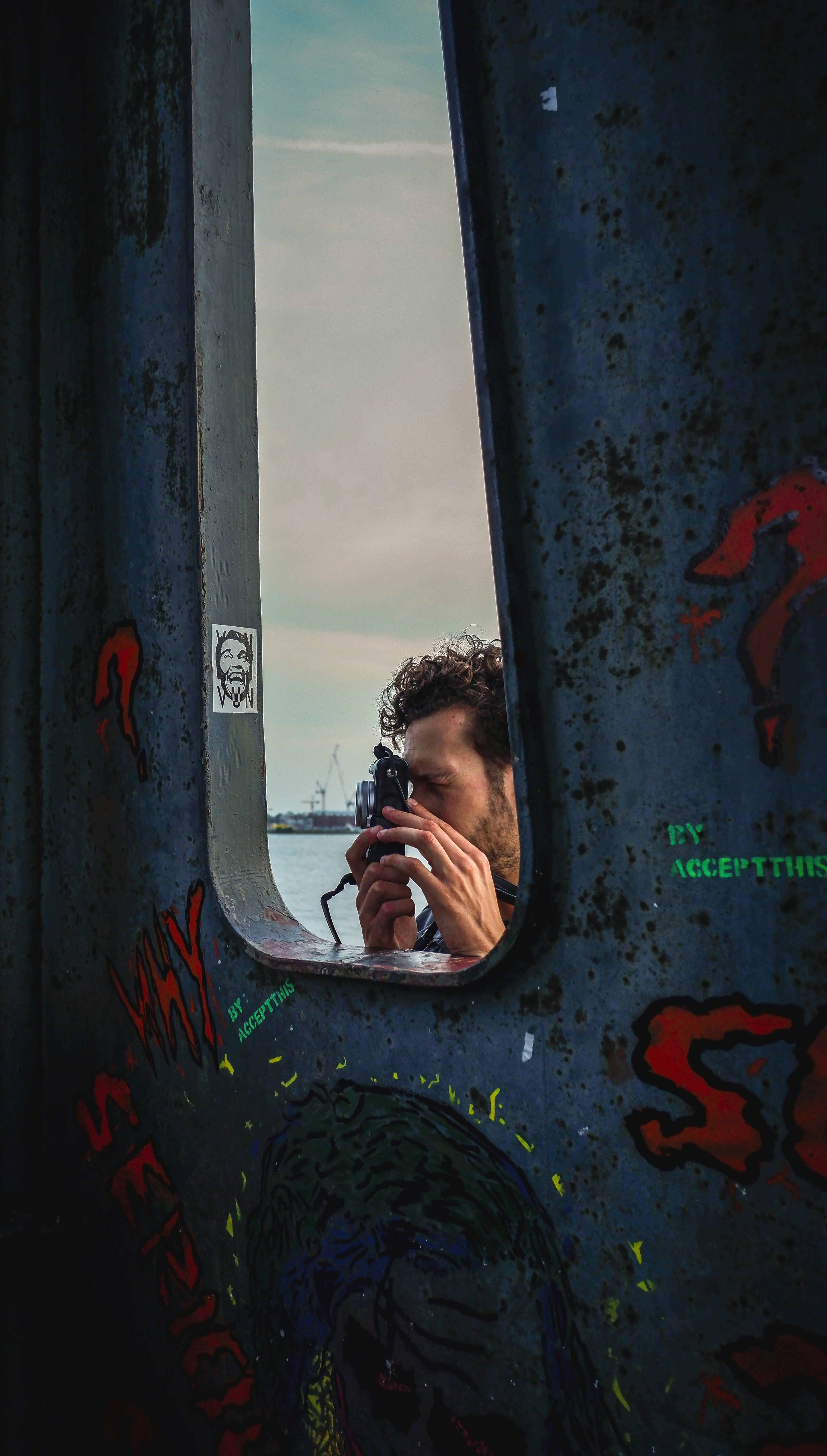 man holding black smartphone