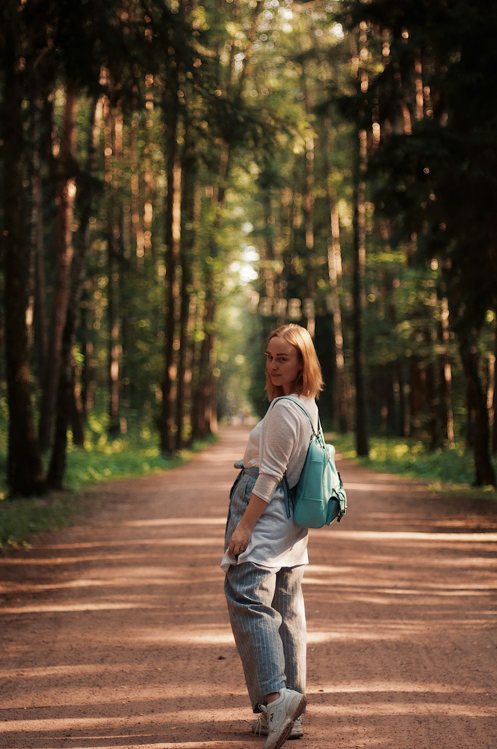 woman standing on road