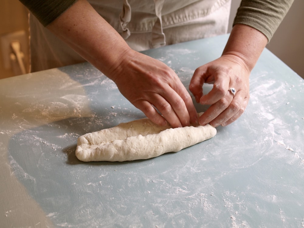 person holding doouggh