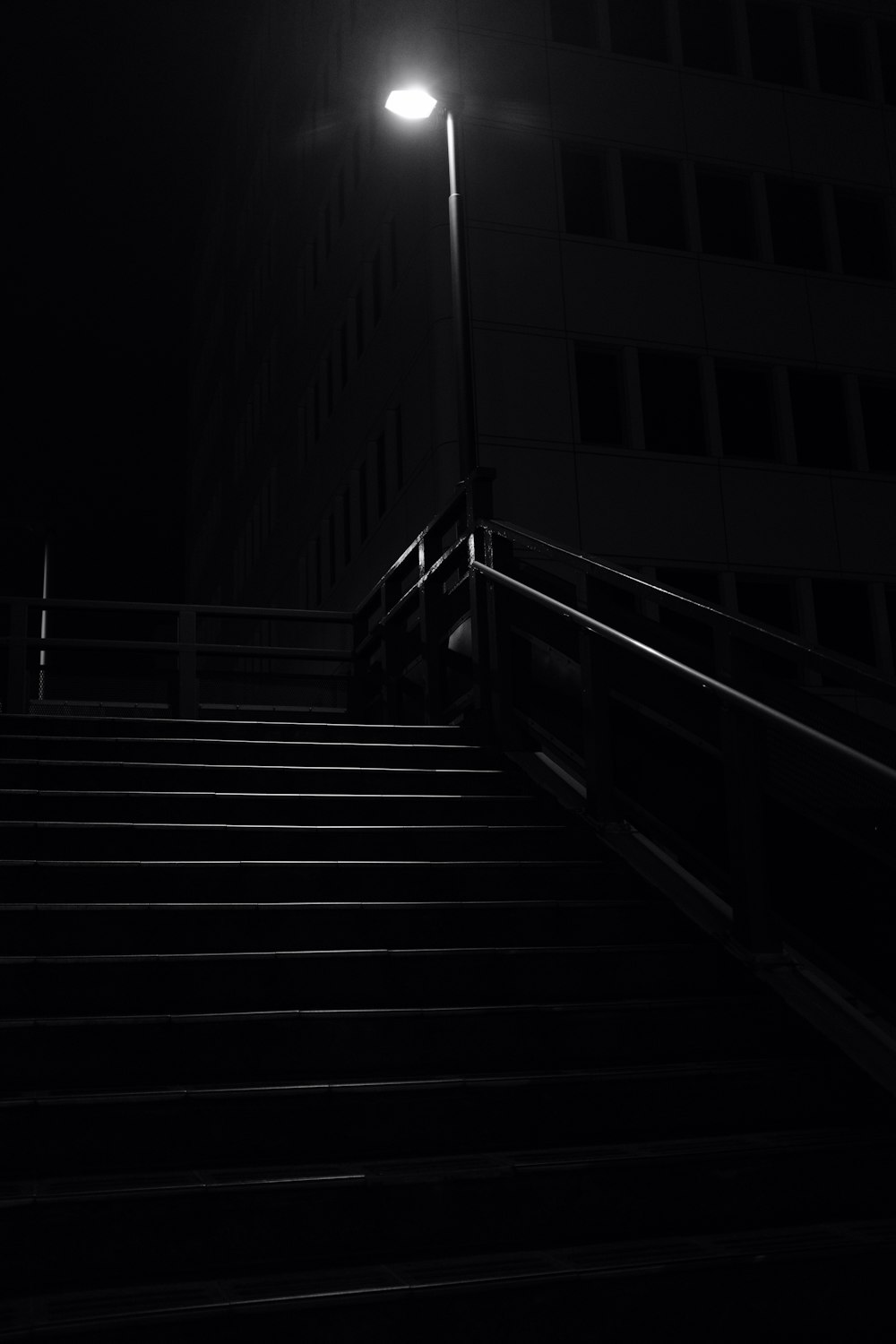 gray stair during night time