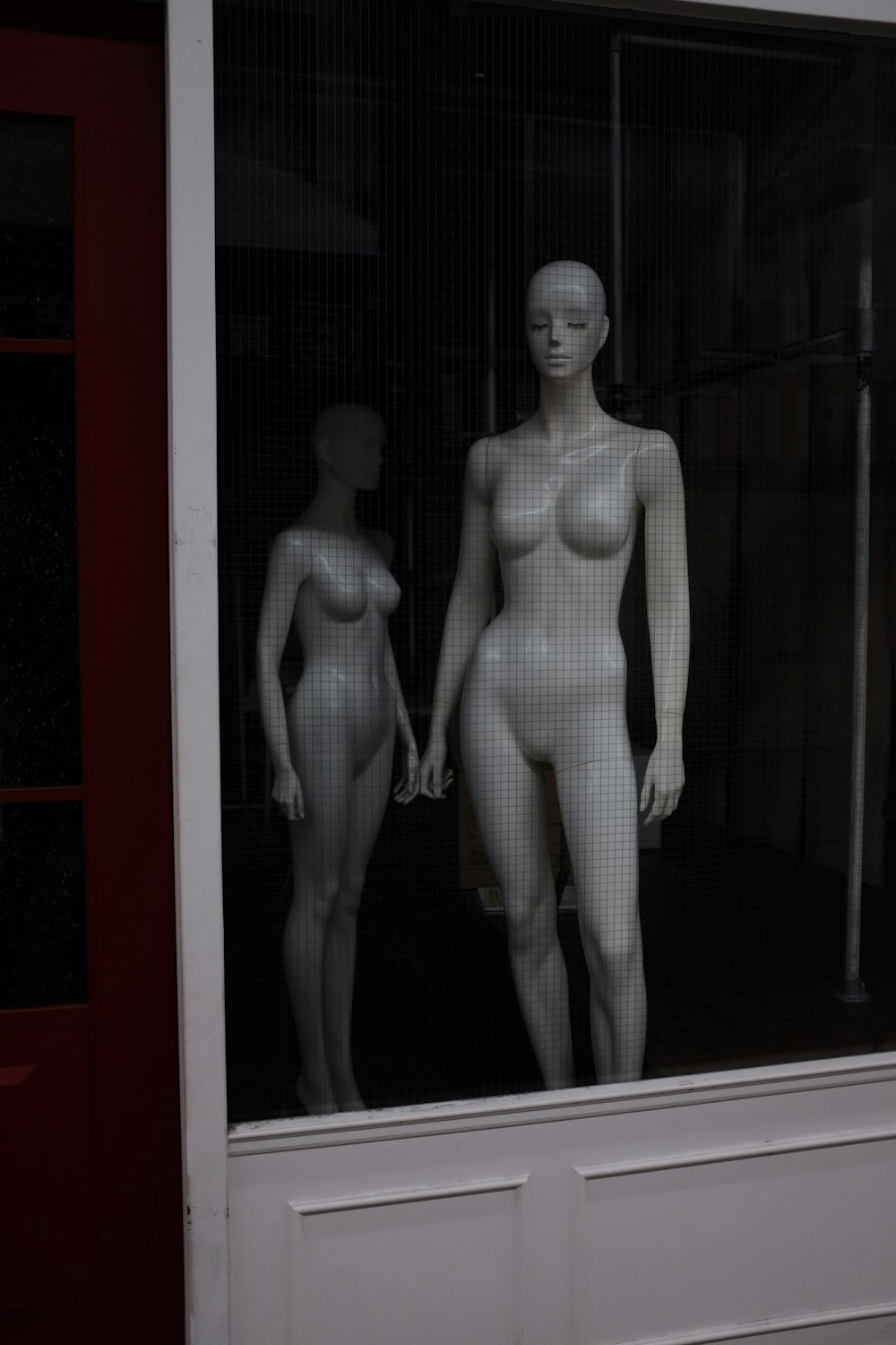 two white female mannequins photo