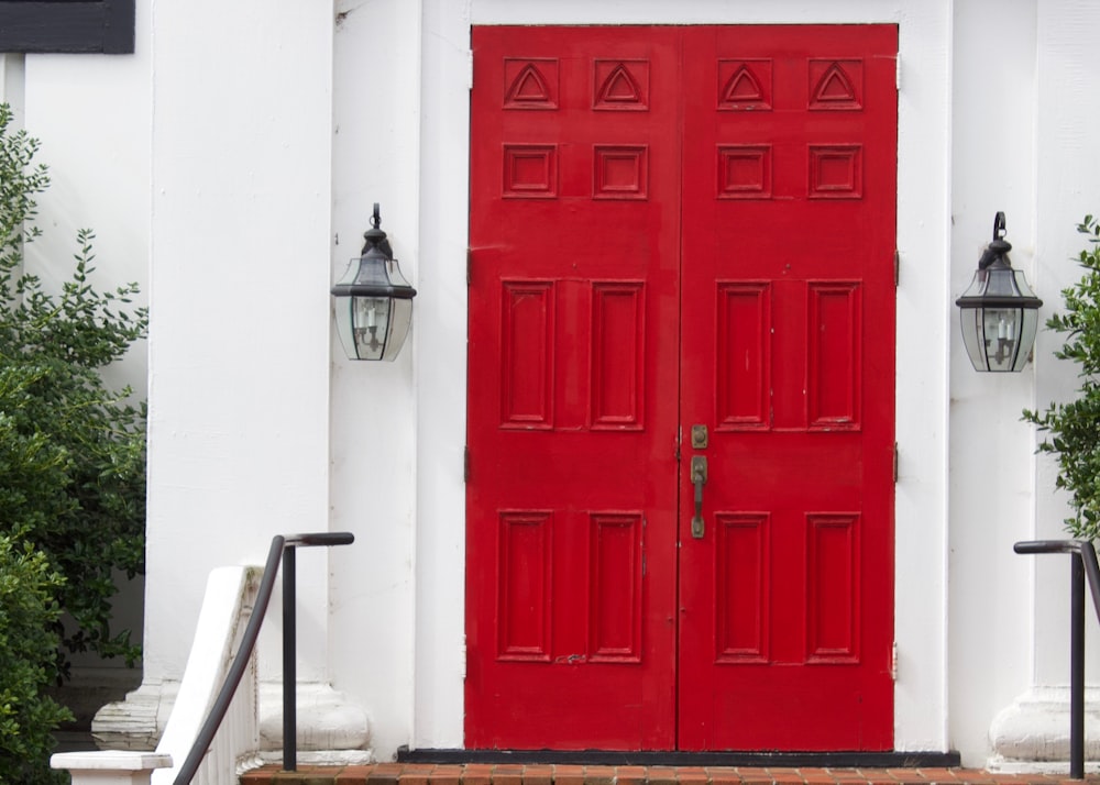 closed red wooden doors