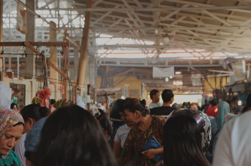 people standing under building