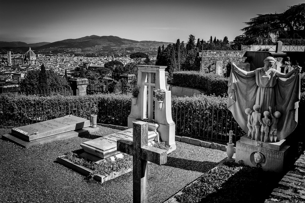 greyscale photo of statue