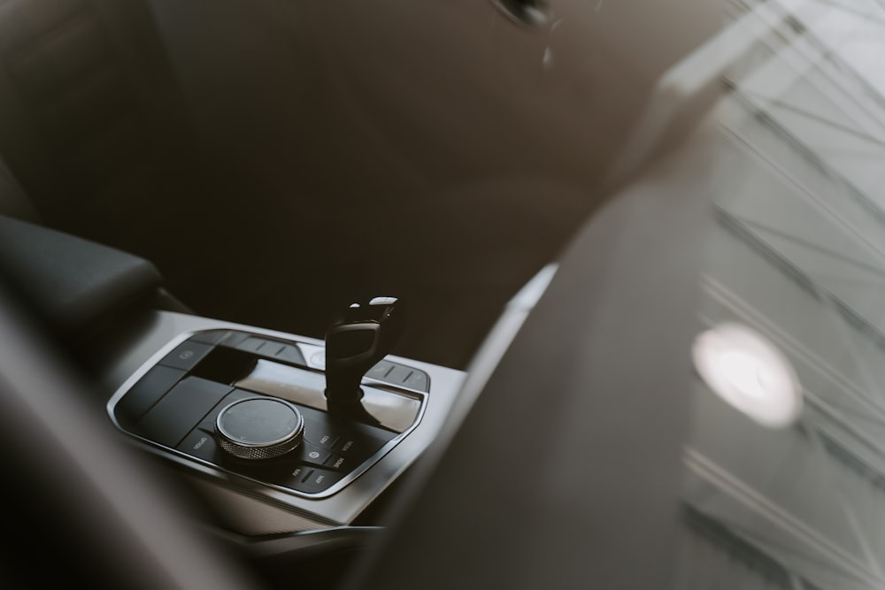 a close up of a car's dashboard with a steering wheel