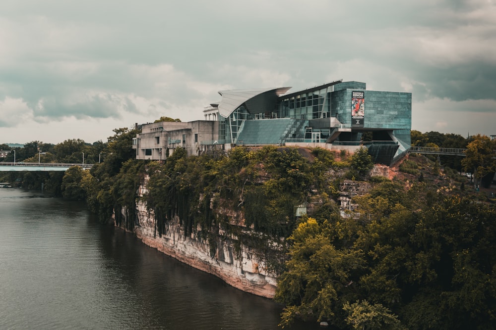 buildings on cliffs near body of wate