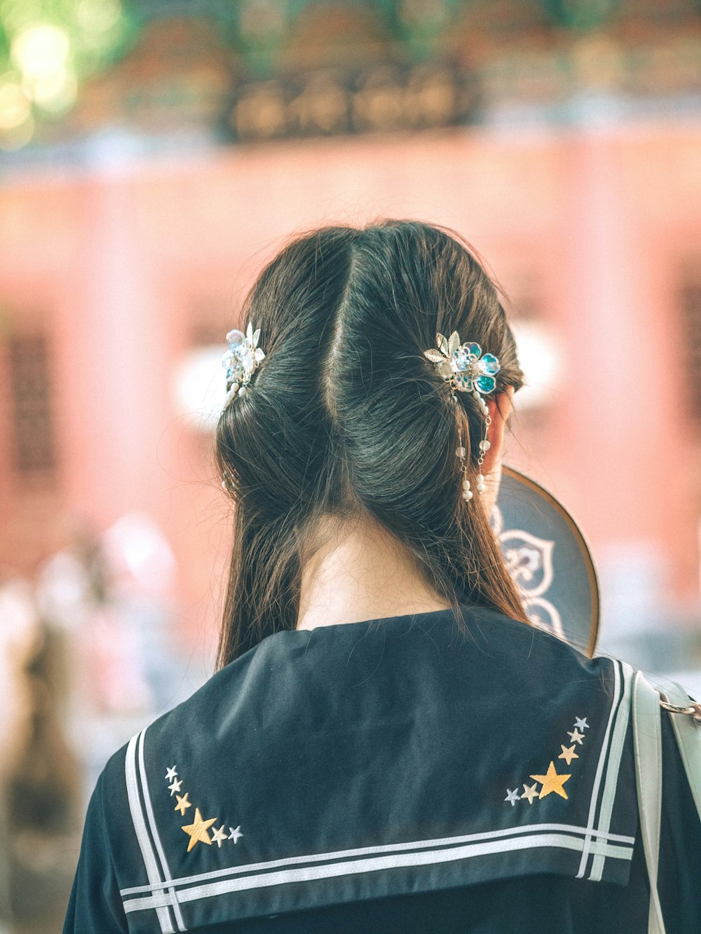 women wearing black school uniform close-up photography