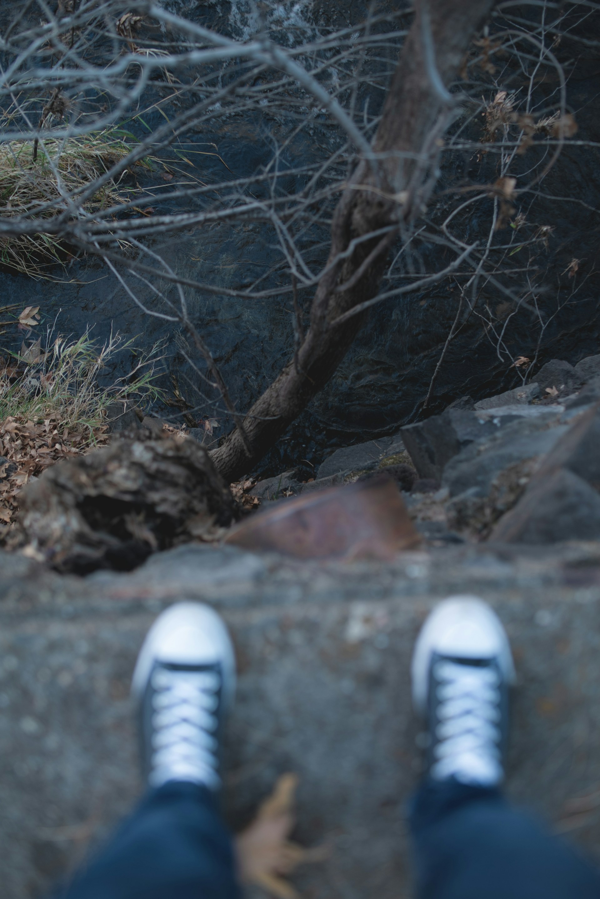 woman wearing yellow long-sleeved dress under white clouds and blue sky during daytime
