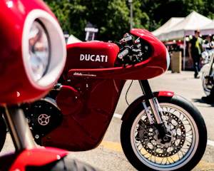 A vibrant collage of motorbike gear, influencers, and brand logos in red tones.